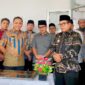 Kepala Dinas Pemuda dan Olahraga (Dispora) 

Lampung, Descatama Paksi Moeda, sat 
mendampingi PJ Gubernur Lampung Samsudin (dok Humas KONI Lampung).