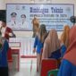 Narasumber dari Perpustakaan Provinsi Lampung Liza tengah memberikan semangat kepada para peserta. Foto.Juwantoro
