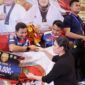 Kepala Pelatih ATIA Indonesia, Ahmad Amruloh menagkat trofi di Kejuaraan Bela Negara 2025 di Palembang ( ist)