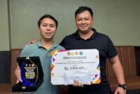 Atlet muda asal Lampung Selatan, Agung poto bersama Ketua Umum POBSI Provinsi Lampung, Taufan Aditya Irana