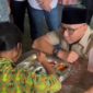 Poto: Gubernur Lampung Menyaksikan Siswa Sedang menyantap Makanan yang disajikan dari Dapur MBG ( ist).