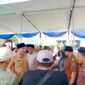 Wakil Bupati Lampung Selatan M.Syaiful Anwar tengah memantau operasi pasar murah di Lapangan Desa Merbau Mataram, Kecamatan Merbau Mataram, Selasa, 14 Oktober 2025. (Foto.Dok.Disdagprind Lamsel)