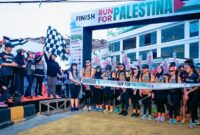 Wulan Sari, melepas ratusan peserta Charity Run For Palestina (Dok Diskominfo Provinsi Lampung).