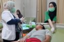Poto: Atlet beldiri lampung korban pengeroyookan sedang menjalani pengobatan dokter (dok HUMAS KONI).