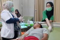Poto: Atlet beldiri lampung korban pengeroyookan sedang menjalani pengobatan dokter (dok HUMAS KONI).